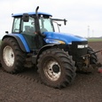 New Holland TM140 met hakfrees